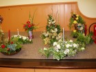 Tableau of Christmas Flower Arrangements